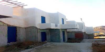 Εσόδα 2 δισ. από τις ρυθμίσεις για τα αυθαίρετα