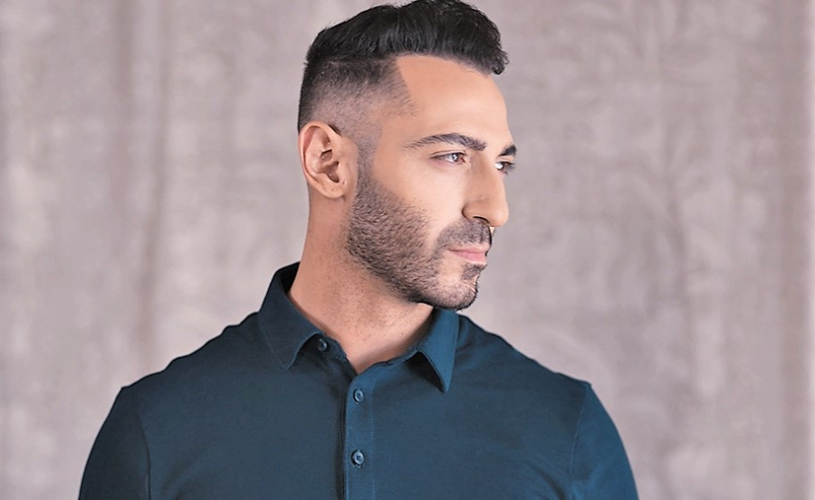 «Μείνε εδώ»: Ο Νικόλας Χρηστίδης ερμηνεύει το νέο τραγούδι του Γιώργου Χατζηνάσιου