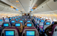 Γιατί υπάρχουν μικρά τρίγωνα πάνω από τις θέσεις στα αεροπλάνα