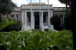 Μαξίμου: Ο Μητσοτάκης φόρεσε τη φανέλα του ΔΝΤ στο Βερολίνο