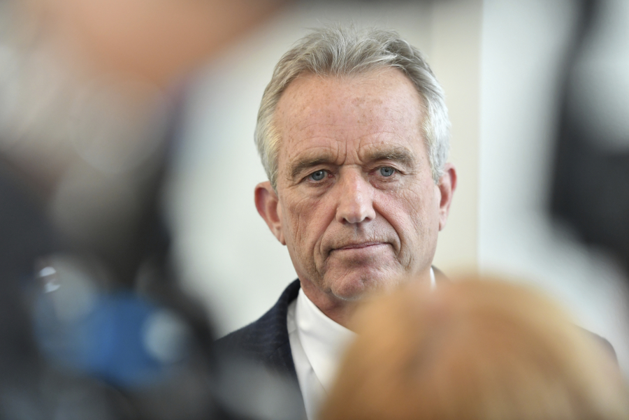 Josh Edelson/Pool Photo via AP